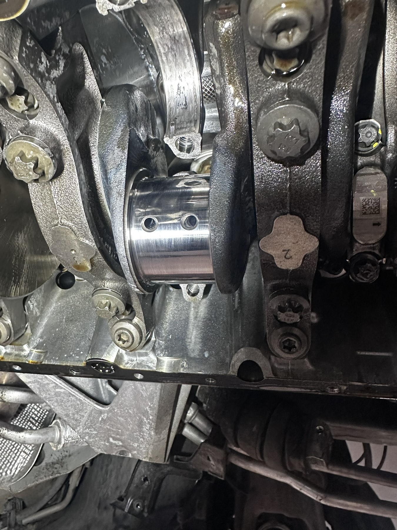 S63 crankshaft journal exposed during a bearing inspection
