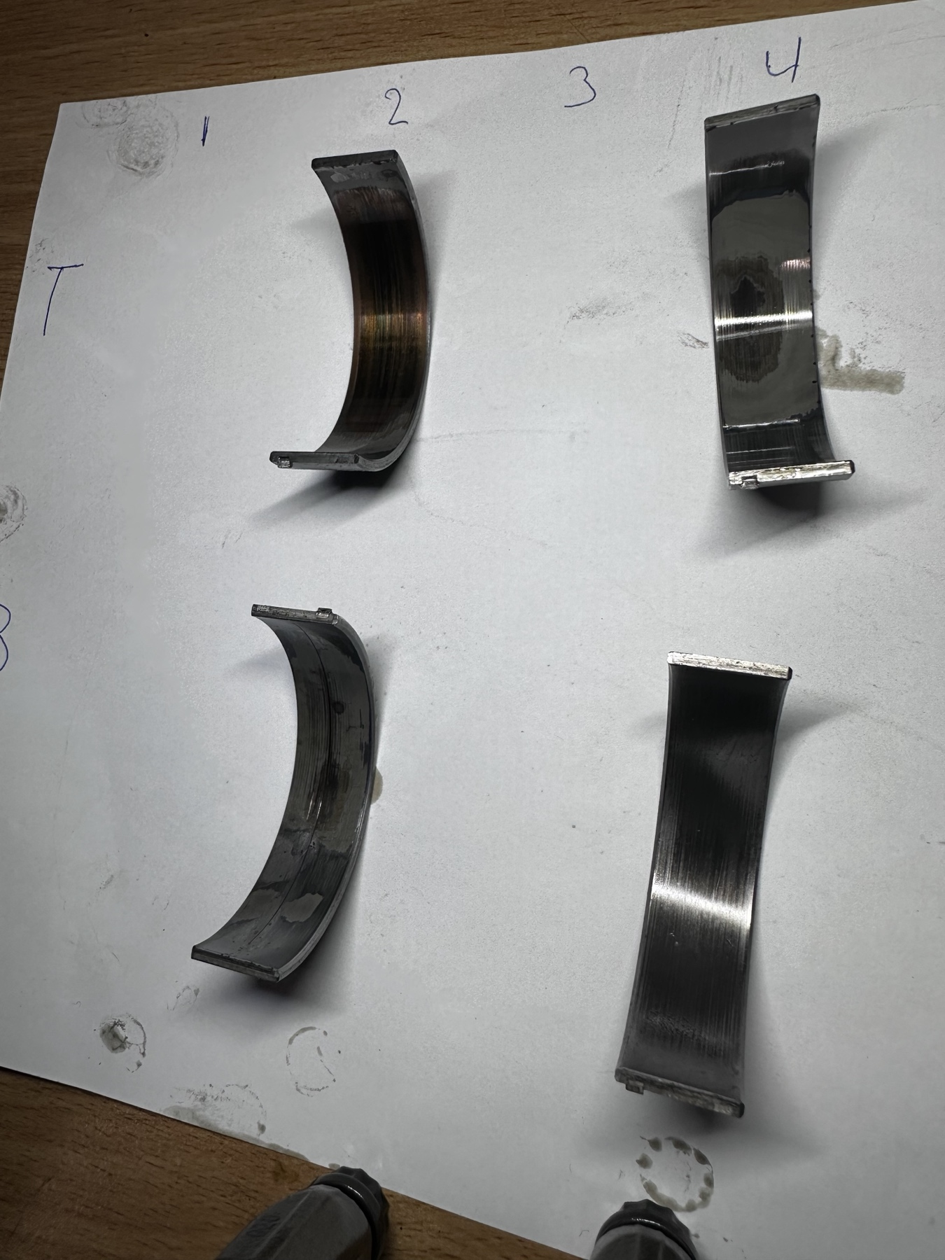 Removed BMW S65 bearings at 110,000 km with wear reaching the copper layer