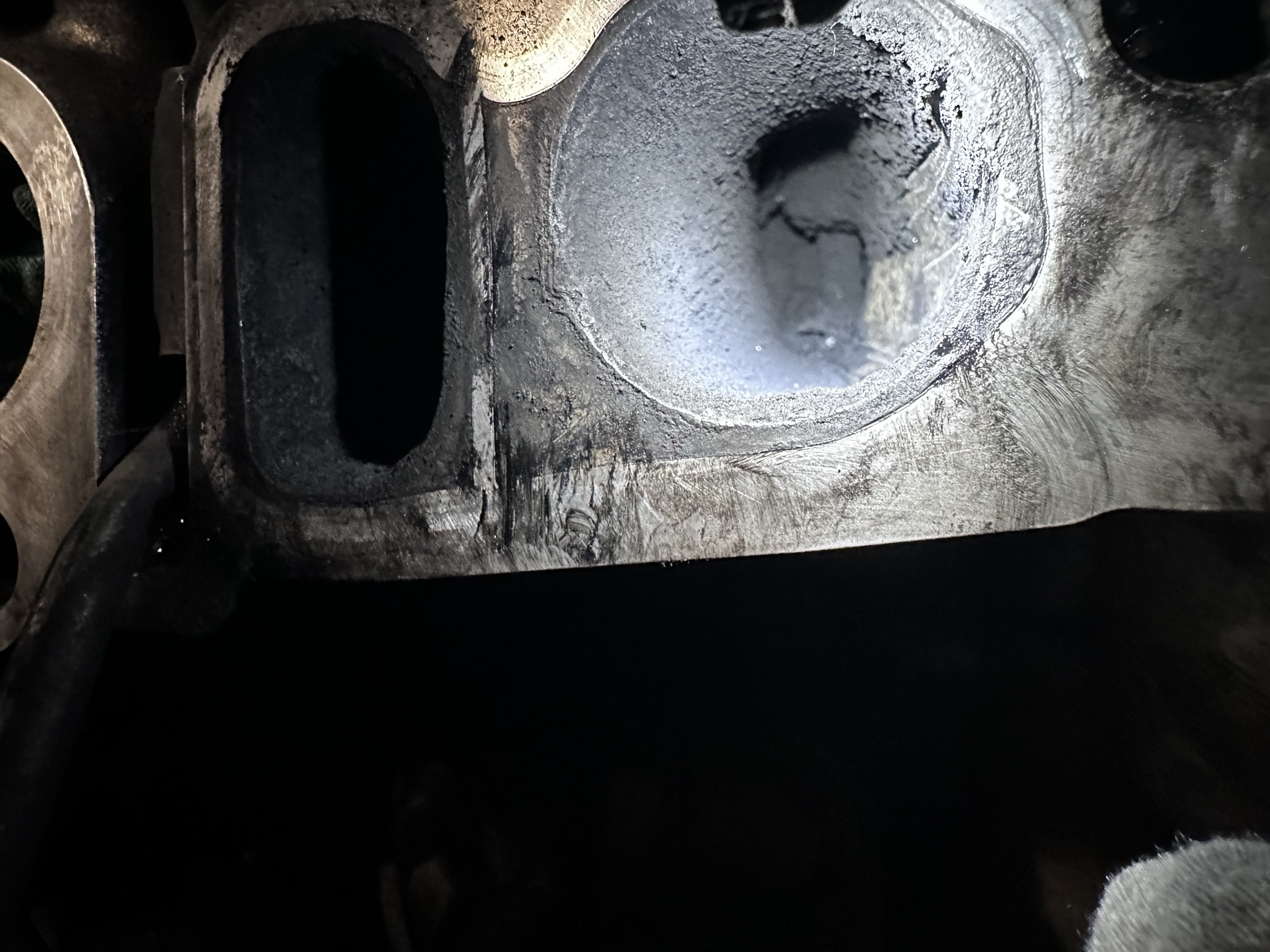 Visible deposits on the intake port and valve area.